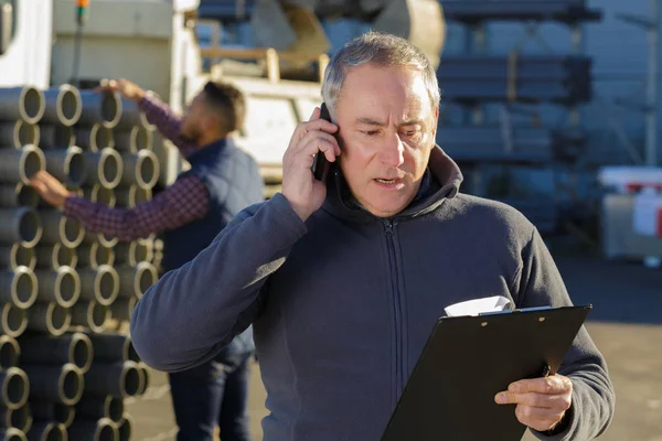 Man Telephone Materials Yard — Stock Photo, Image