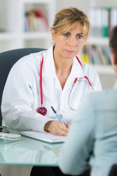 Doctor Listening Patient Making Notes — Stock Photo, Image
