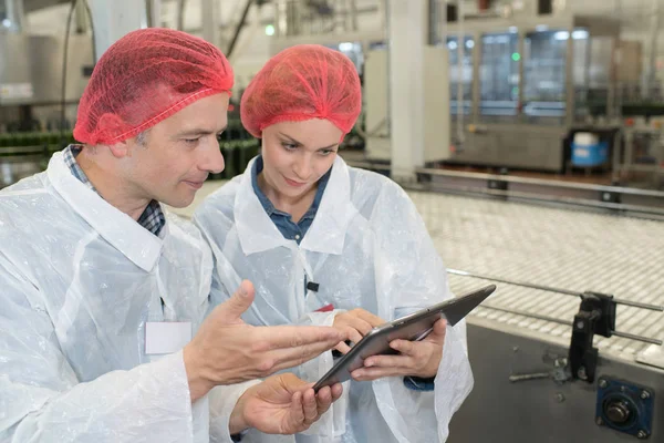 Positive Workers White Coats Talking Factory — Stock Photo, Image