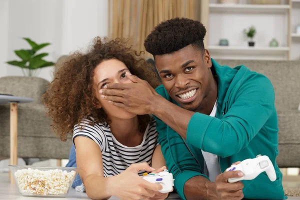 Young couple having fun while playing video-games — 스톡 사진