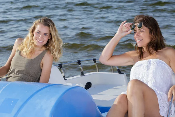 Women on a pedal boat — Stock Photo, Image