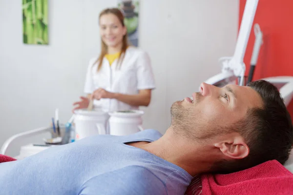 Man getting ready for a wax treatment — Stock Photo, Image