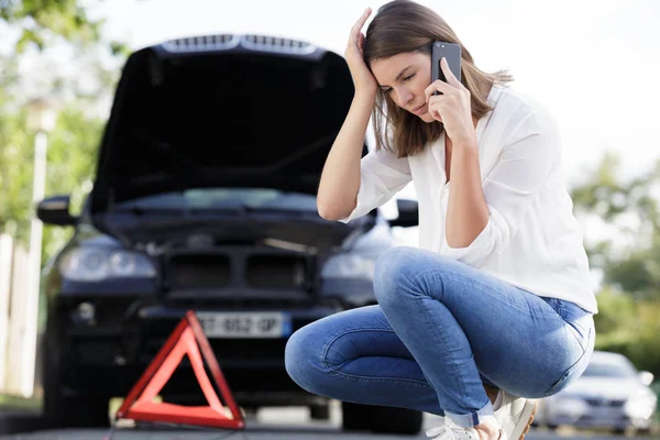 woman calling road assistance