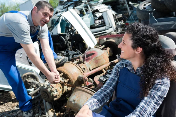 Worker on junkyard and male — Stock Photo, Image