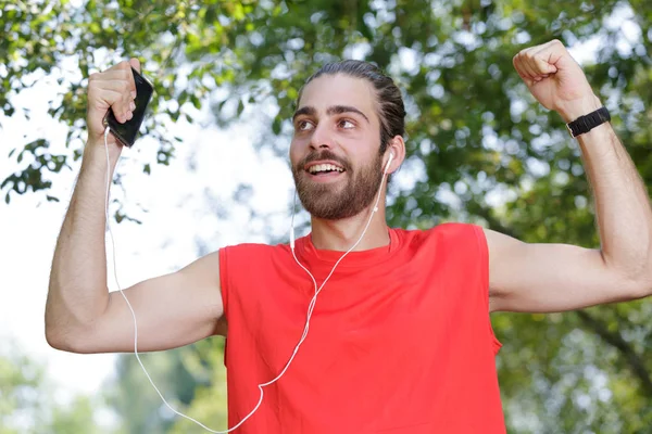 Boldog ember fut zenével — Stock Fotó