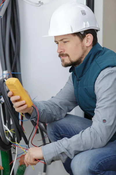 Electrical Student Checks Phase Rottation High Voltage Cable — Stock Photo, Image