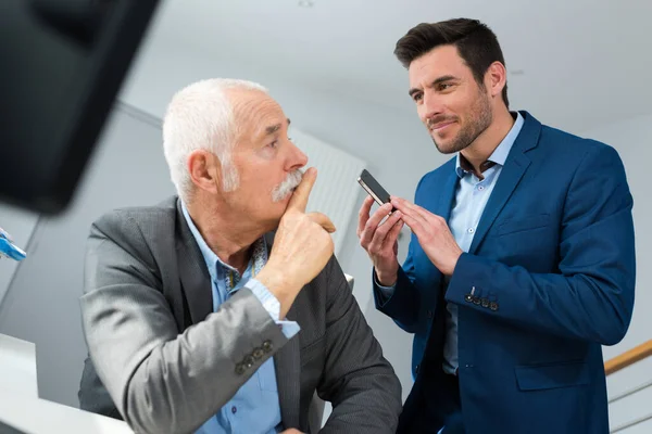 Serious Senior Businessman Younger One — Stock Photo, Image