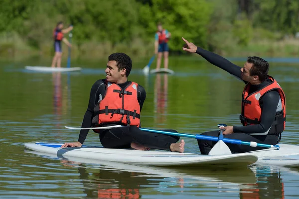 Friends Chating Stand Paddleboarding — Stock Photo, Image