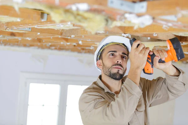 Male Builder Drill Indoors — Stock Photo, Image