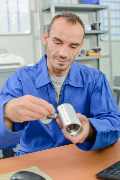 Male Worker Holding Security Camera — Stock Photo, Image
