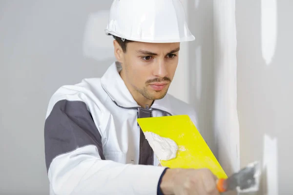 Worker Applying Filler Wall — Stock Photo, Image