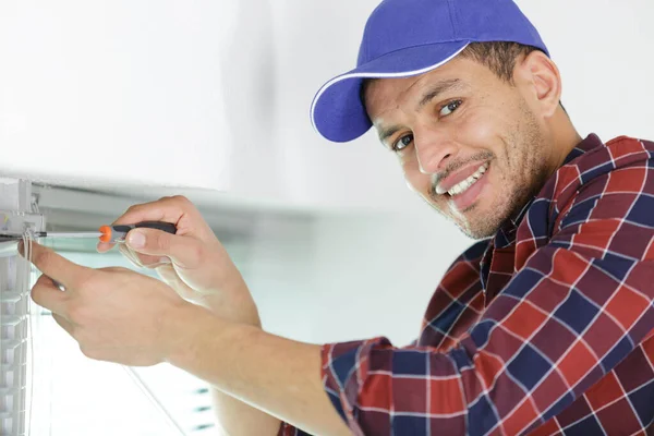 Young Handyman Repair Window Screwdriver — Stock Photo, Image