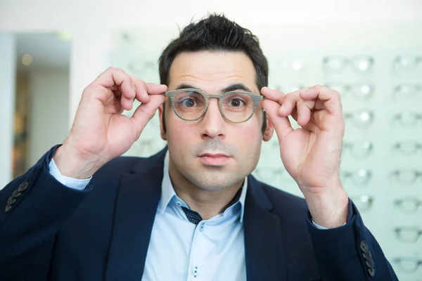 Man Fitting Eyeglasses Optical Shop — Stock Photo, Image