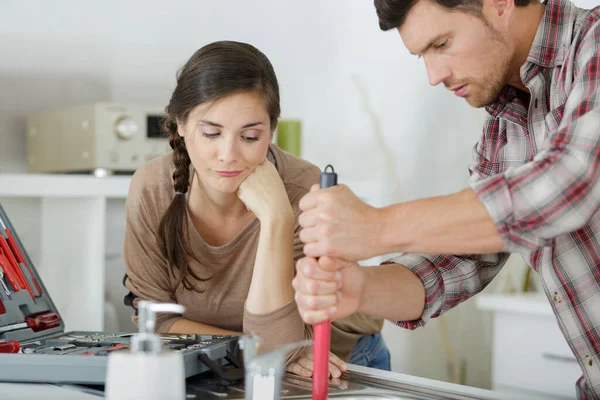 Upset Couple Fixing Kitchen Sink — Stock Photo, Image