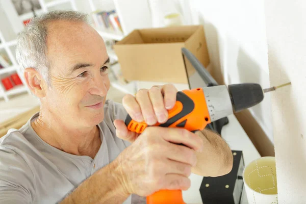 Senior Man Using Cordless Screwdriver Home — Stock Photo, Image