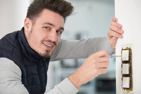 Side View Young Man Repairing Light Switch Home — Stock Photo, Image