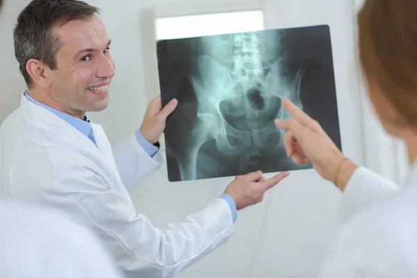 Doctor Holding Xray Student Pointing — Stock Photo, Image