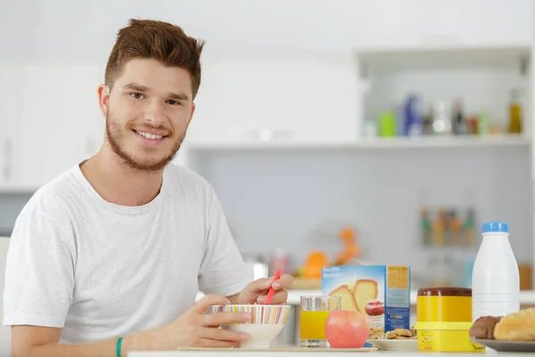 Portrait Adolescent Man Eating Breakfast Home Stock Picture
