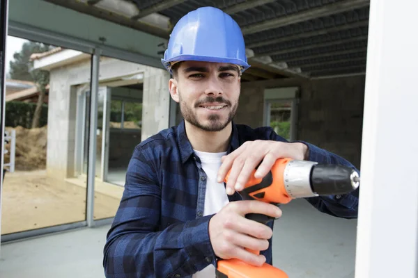 Man Helmet Electric Drill Making Hole Wall — Stock Photo, Image