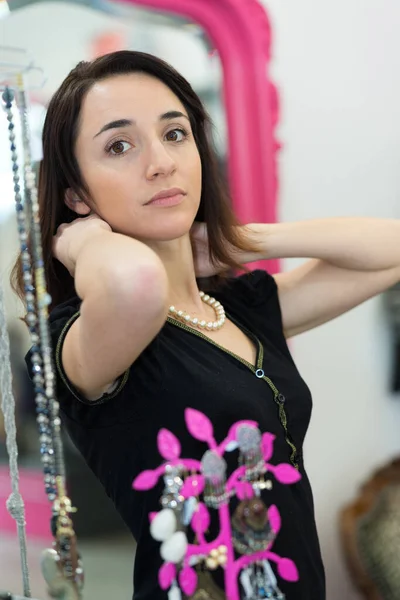 Woman Trying Necklace — Stock Photo, Image