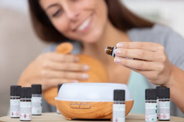 Woman Dripping Essential Oils Diffuser — Stock Photo, Image