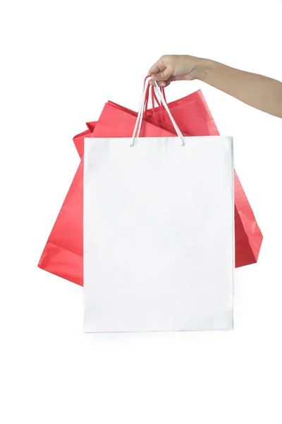 Mano Con Sacchetti Carta Sfondo Bianco Studio Shoot Shopping Concetto — Foto Stock