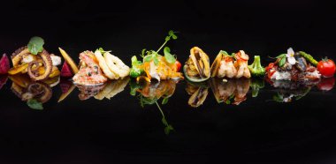 Deniz ürünleri tabağı, yaratıcı restoran yemek, iyi yemek kavramı