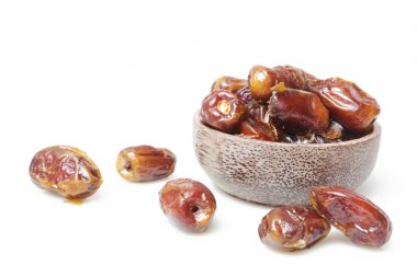 Tarihleri küçük kapta - kurutulmuş studio ateş üzerinde beyaz