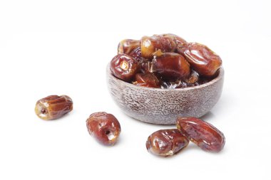 Tarihleri küçük kapta - kurutulmuş studio ateş üzerinde beyaz