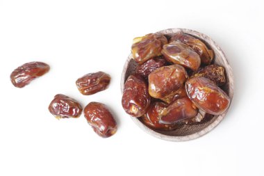 Tarihleri küçük kapta - kurutulmuş studio ateş üzerinde beyaz