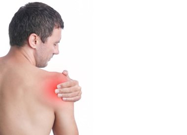 Omuz ağrısı ile genç adam stüdyo çekim