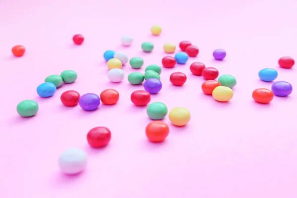 Bunte Bonbons Auf Rosa — Stockfoto