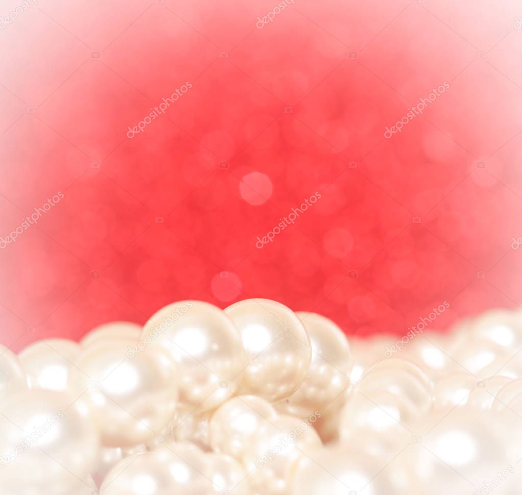 Pile of pearls on red. Pile of pearls on red Christmas background 