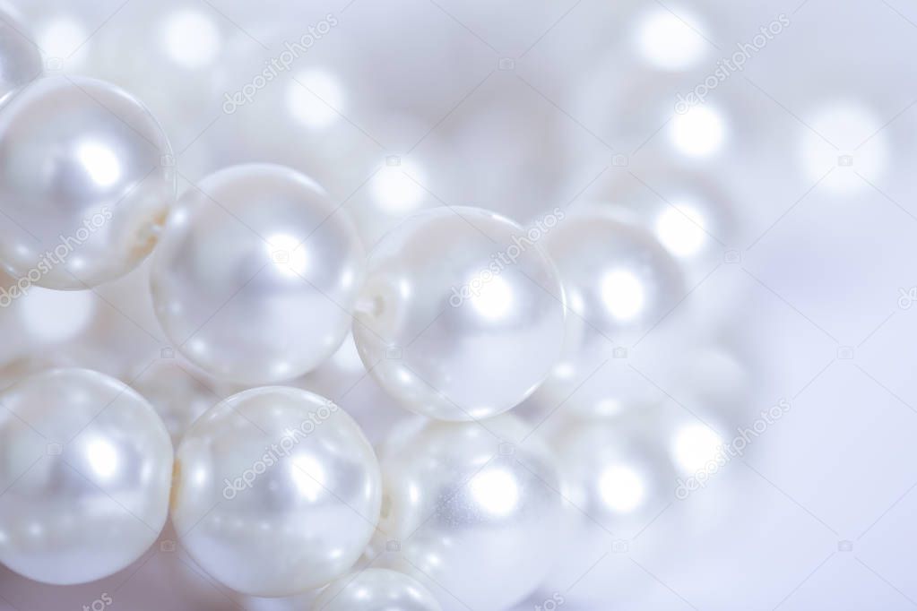 Pile of pearls on the white background