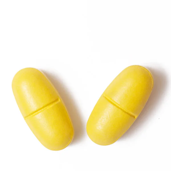 Желтые Таблетки Белом — стоковое фото