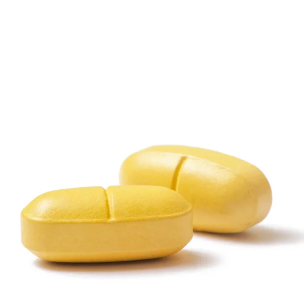 Yellow Pills White — Stock Photo, Image