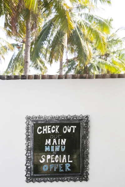 Restaurant board in tropical resort