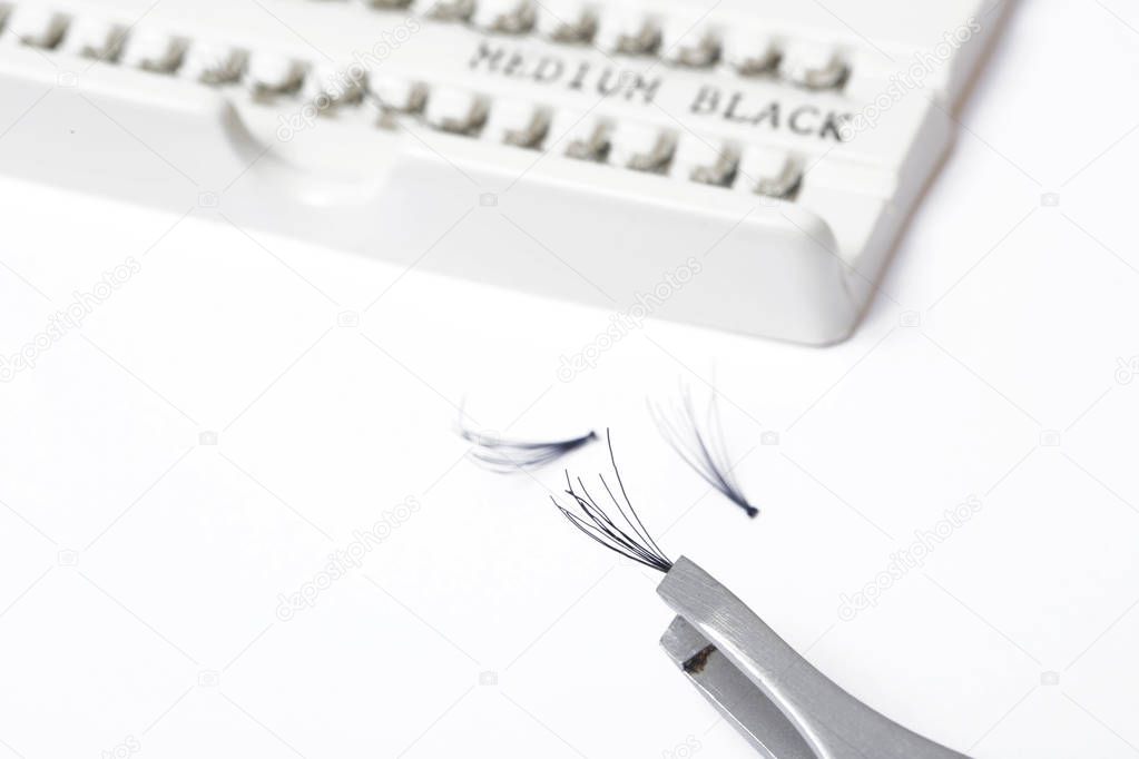 False individual eyelashes on white