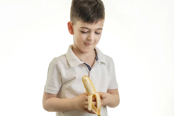 Studioaufnahme Eines Jungen Der Banane Isst Konzept Für Gesunde Essgewohnheiten — Stockfoto