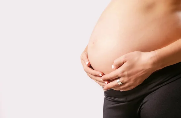 Kobieta Ciąży Brzuch Strzał Studio — Zdjęcie stockowe