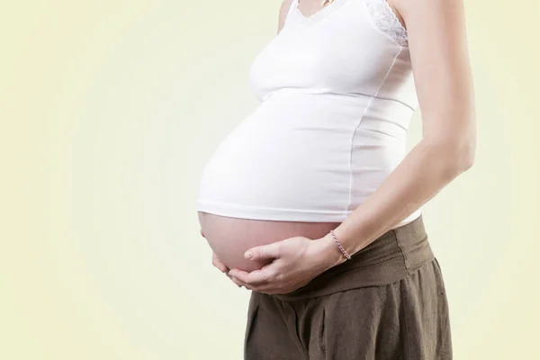 Schwangerschaftsbauch Studioaufnahme — Stockfoto