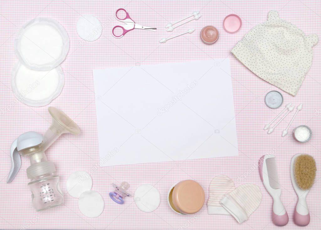 Newborn items on the pink background, knolling style. Top view. Flat lay.