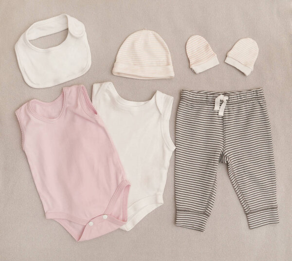 Top view of set of baby clothes