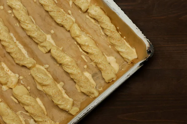 Pastry on the baking sheet, before baking