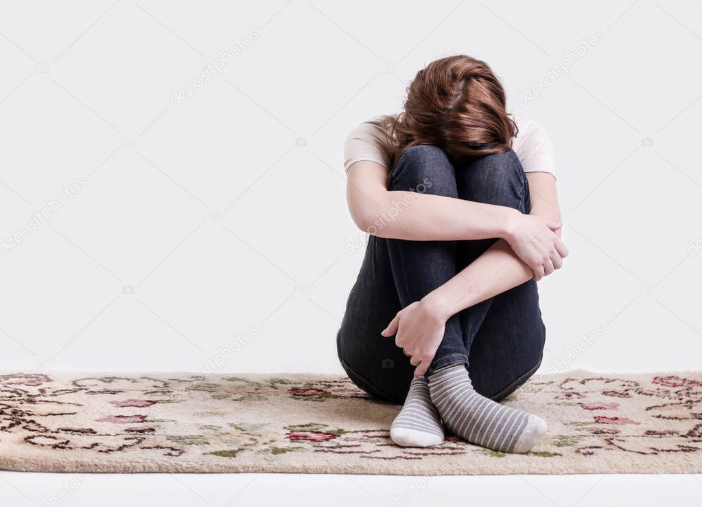 Portrait of lonley depressed woman, quiet anxiety concept