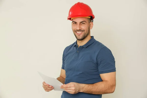 Close up shot of cheerful satisfied attractive male wears a red — Stock Photo, Image