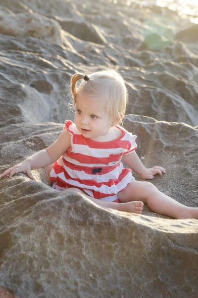 One Year Old Baby Girl Red White Dress Sitting Rocky — Stock Photo, Image