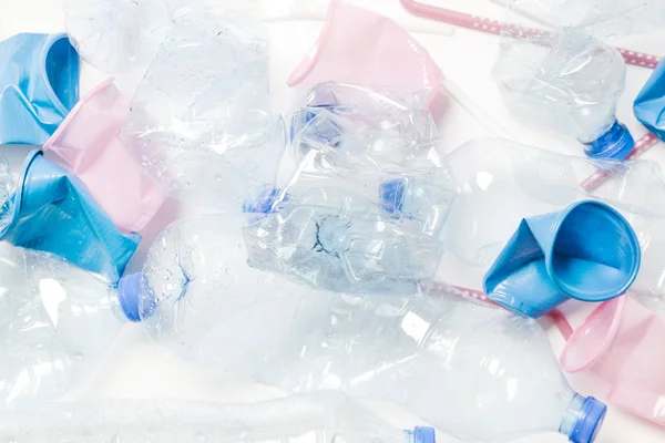 Crumpled single-use plastic waste, studio shot. — Stock Photo, Image