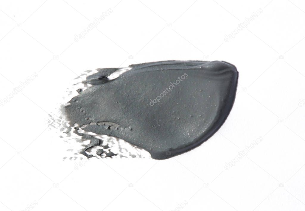 Clay or charcoal face mask stroke isolated on white
