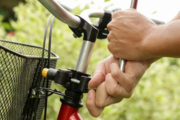 Front bicycle baby seat installation steps. A series of images, how to put kid seat on a bicycle handlebar